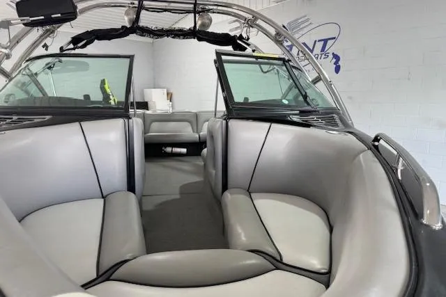 Slide: The Image of 2007 Calabria CAL AIR PRO V boat interior with gray seating and open windshield. - 12