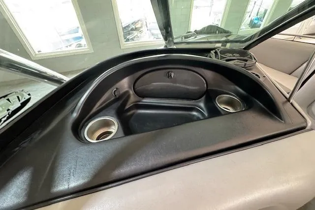 Slide: The Image of Dashboard of 2007 Calabria CAL AIR PRO V boat with cup holders. - 7