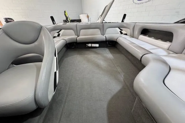 Slide: The Image of Interior of a 2007 Calabria CAL AIR PRO V boat with gray seating. - 9