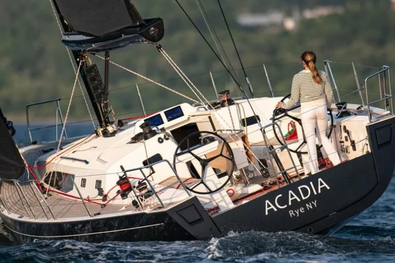 Slide: The Image of 2026 J Boats J/45 sailboat on calm water, showcasing sleek design and modern features. - 8