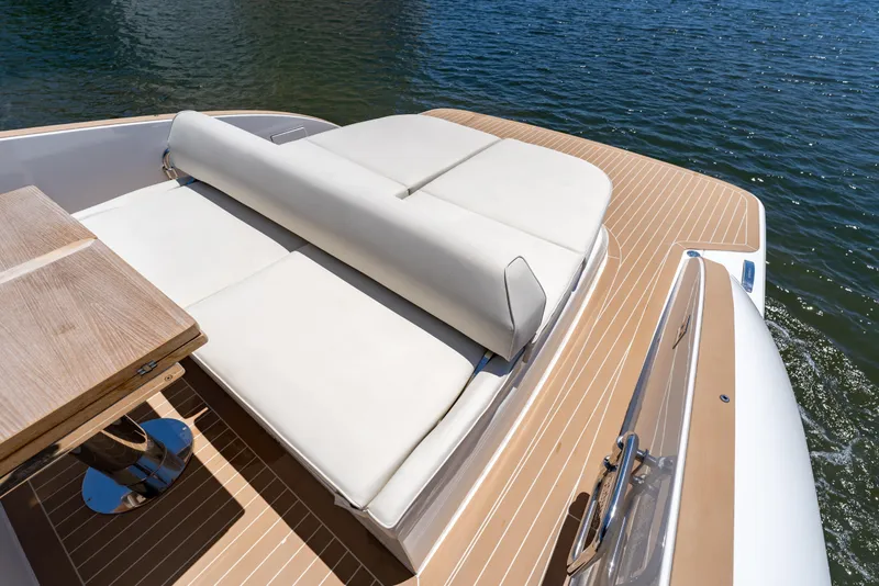 Slide: The Image of Luxurious deck of 2027 Solaris Power 40 Open yacht with sunbed and table. - 14