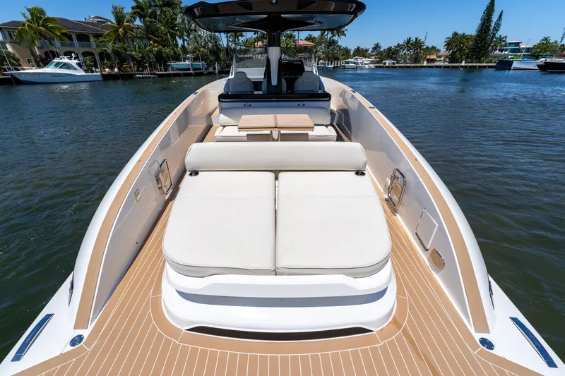 Slide: The Image of 2027 Solaris Power 40 Open yacht with spacious deck and luxurious seating on a sunny day. - 16