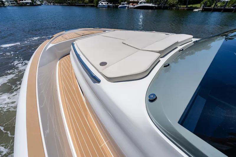 Slide: The Image of 2027 Solaris Power 40 Open yacht with sleek deck design on calm waters. - 23
