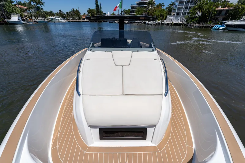 Slide: The Image of 2027 Solaris Power 40 Open yacht on a serene waterway, showcasing sleek design and luxury. - 25