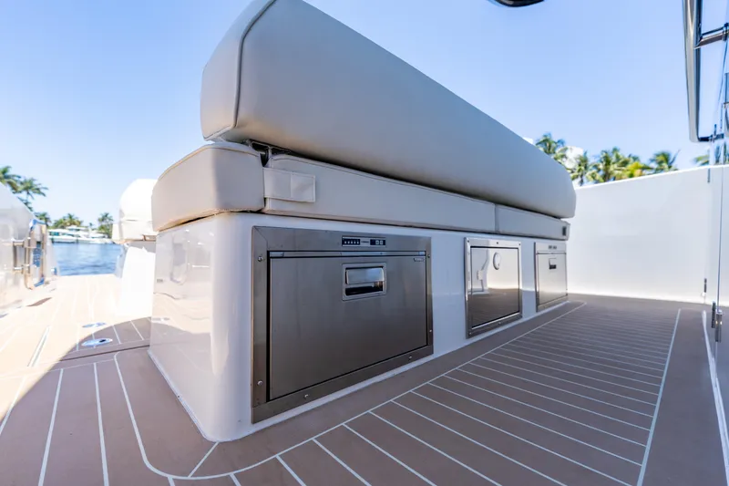 Slide: The Image of Luxurious seating and storage on 2027 Solaris Power 40 Open yacht deck. - 29