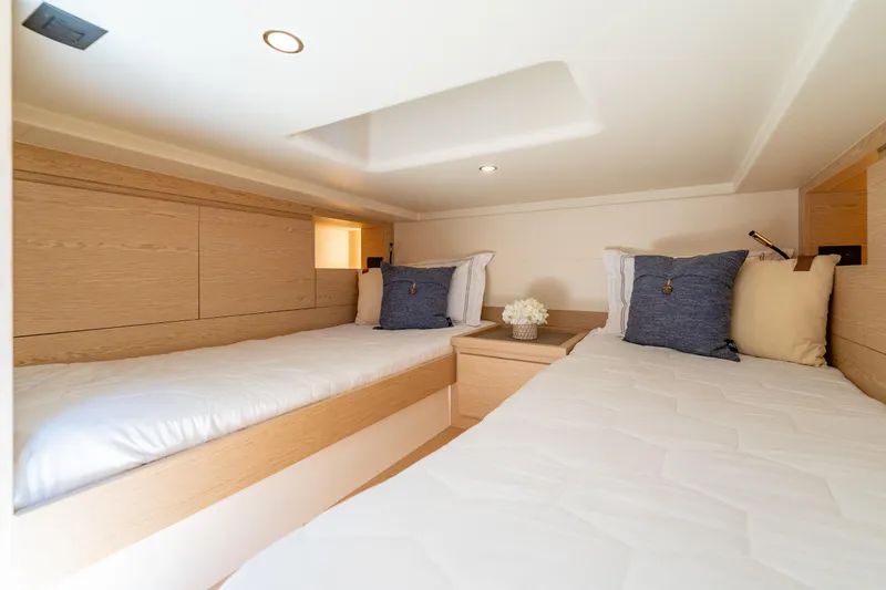 Slide: The Image of Luxurious cabin interior of 2027 Solaris Power 40 Open yacht with twin beds. - 44