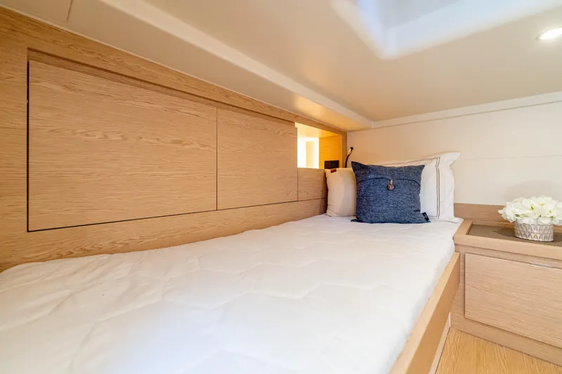 Slide: The Image of Cozy cabin interior of 2027 Solaris Power 40 Open yacht with modern wooden design. - 45