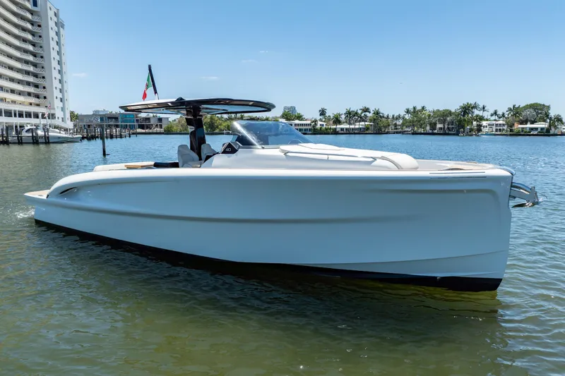 Slide: The Image of 2027 Solaris Power 40 Open yacht on calm water, modern design, sunny day. - 8