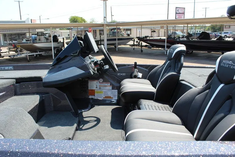 Slide: The Image of Trolling motor on 2026 Skeeter ZXE21 boat, featuring Ultrex technology. - 11