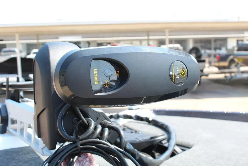 Slide: The Image of 2026 Skeeter ZXE21 boat interior with sleek black seats and modern dashboard. - 12