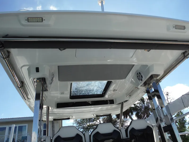 Slide: The Image of 2023 Jeanneau Leader 10.5 WA Series 2 boat interior with skylight and seating. - 43