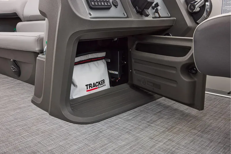 Slide: The Image of Manufacturer Provided Image: 2026 Sun Tracker Party Barge 20 DLX storage compartment with Tracker Boats bag. - 39