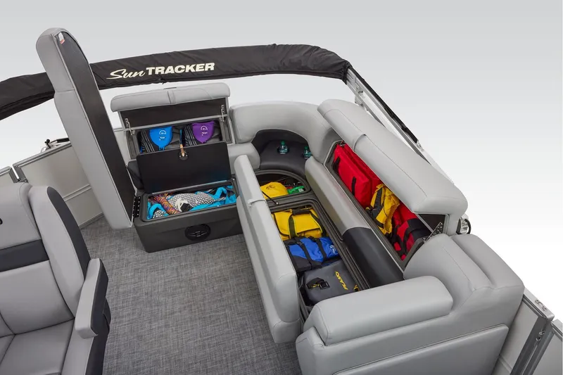 Slide: The Image of Manufacturer Provided Image: 2026 Sun Tracker Party Barge 20 DLX interior with ample storage and seating. - 43