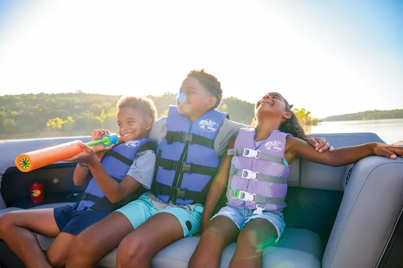Slide: The Image of Manufacturer Provided Image: Children enjoying a ride on a 2026 Sun Tracker Party Barge 20 DLX boat. - 66