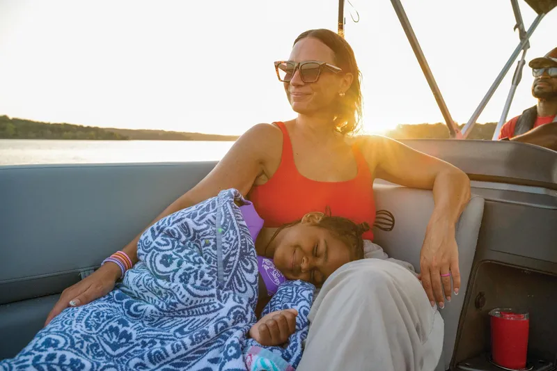 Slide: The Image of Manufacturer Provided Image: Family enjoying sunset on 2026 Sun Tracker Party Barge 20 DLX boat. - 70