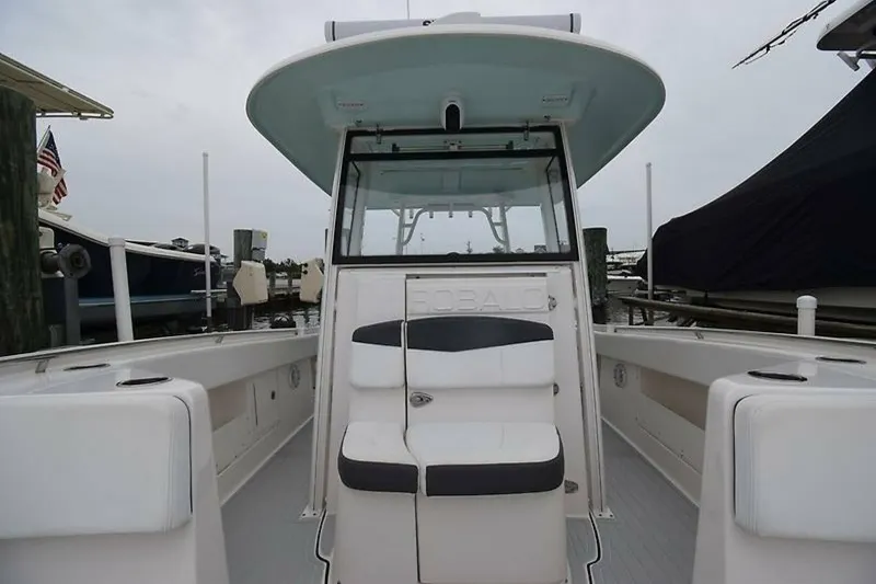 Slide: The Image of 2018 Robalo R302 Center Console boat interior at dockside. - 11