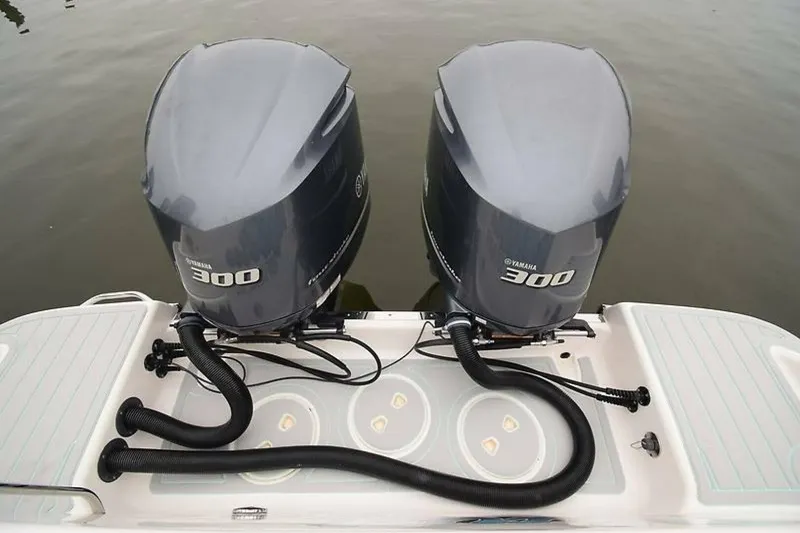Slide: The Image of Twin Yamaha 300 engines on a 2018 Robalo R302 Center Console boat. - 9