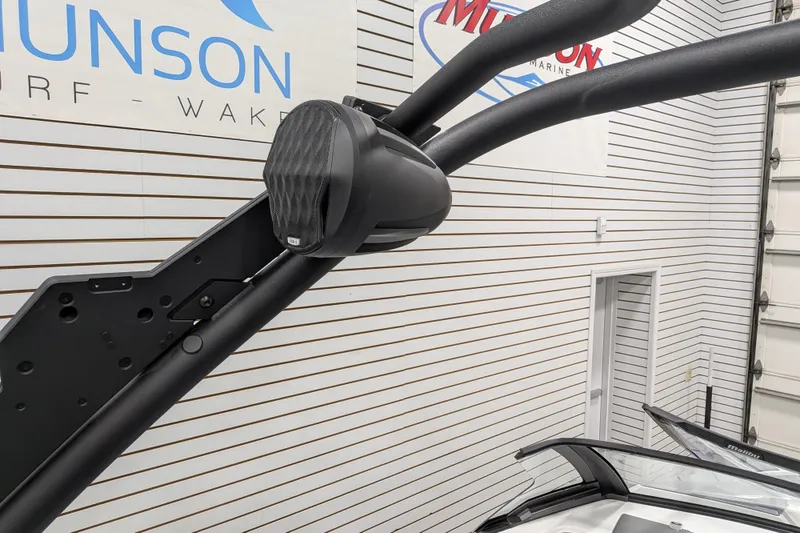 Slide: The Image of 2026 Malibu Wakesetter 20 VTX boat speaker and tower detail in showroom. - 25
