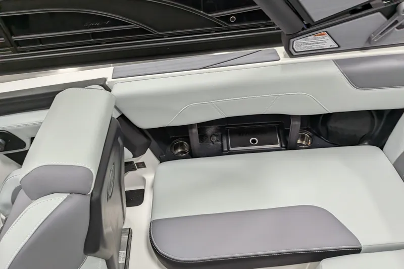 Slide: The Image of 2026 Malibu Wakesetter 20 VTX interior seating with sleek, modern design and storage features. - 9