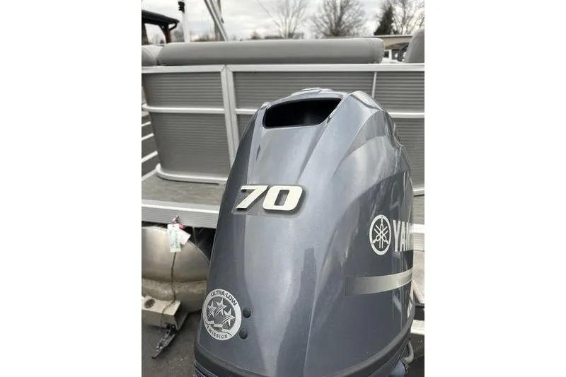 Slide: The Image of 2023 Bennington 21 SL pontoon boat with Yamaha 70 outboard motor. - 13