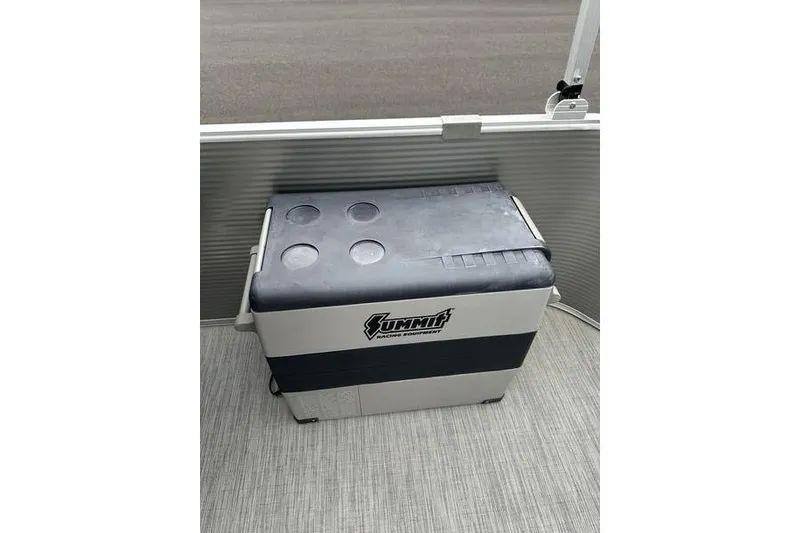 Slide: The Image of Summit cooler on 2023 Bennington 21 SL boat deck, featuring a durable design. - 18