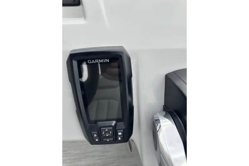 Slide: The Image of Garmin device on 2023 Bennington 21 SL boat dashboard. - 22