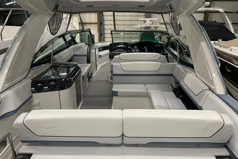 Slide: The Image of 2022 Formula 350 Crossover Bowrider interior with luxurious seating and modern design. - 12