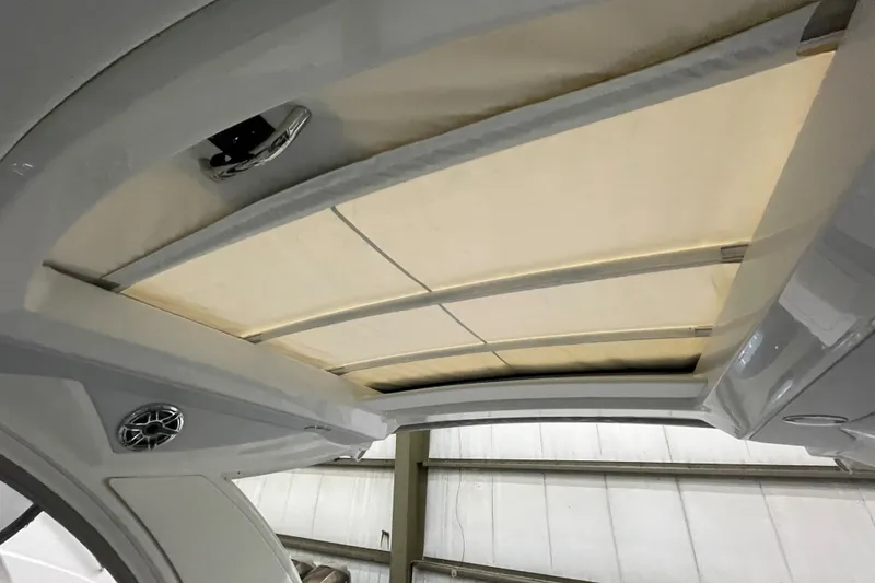 Slide: The Image of 2022 Formula 350 Crossover Bowrider interior roof with speaker and lighting features. - 15