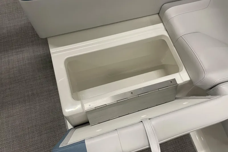 Slide: The Image of 2022 Formula 350 Crossover Bowrider storage compartment with cushioned seating. - 21