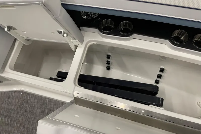 Slide: The Image of 2022 Formula 350 Crossover Bowrider storage compartments and cup holders, open view. - 39