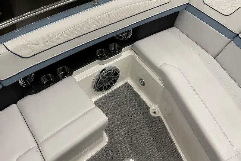 Slide: The Image of 2022 Formula 350 Crossover Bowrider interior with cushioned seating and cup holders. - 48