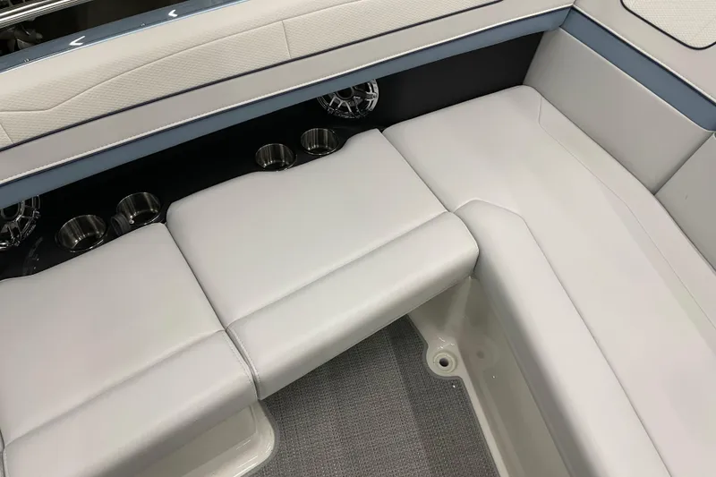 Slide: The Image of 2022 Formula 350 Crossover Bowrider interior seating with cup holders and sleek design. - 49
