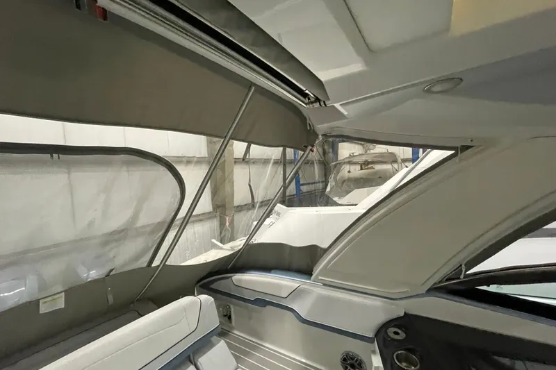 Slide: The Image of 2022 Formula 350 Crossover Bowrider interior with canopy and seating. - 59