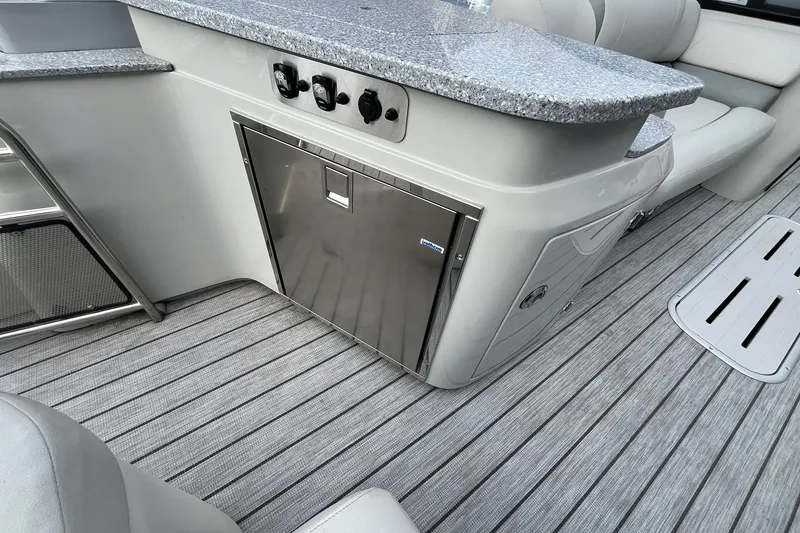 Slide: The Image of Luxurious 2018 Avalon Excalibur Elite boat interior with sleek design and modern amenities. - 17