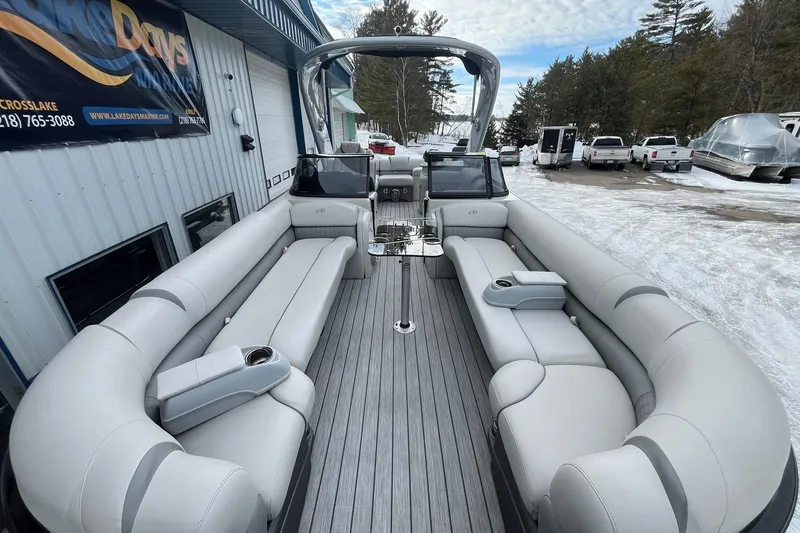 Slide: The Image of 2018 Avalon Excalibur Elite Windshield 27' pontoon boat with luxurious seating and sleek design. - 8
