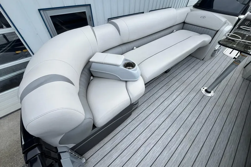 Slide: The Image of Luxurious seating on 2018 Avalon Excalibur Elite Windshield 27' boat, featuring sleek design and comfort. - 9