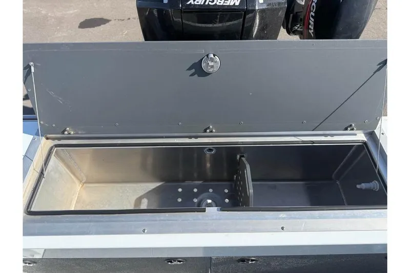 Slide: The Image of Open storage compartment on 2025 Hewescraft 200 ProV ET Hardtop boat. - 10