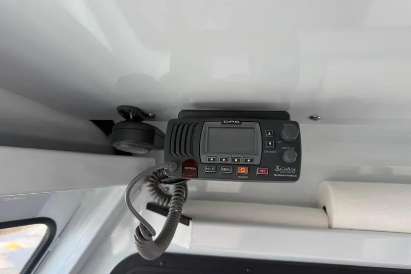 Slide: The Image of 2025 Hewescraft 200 ProV ET Hardtop interior with mounted GPS device. - 20