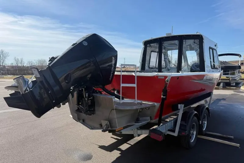 Slide: The Image of 2025 Hewescraft 200 ProV ET Hardtop boat with Mercury outboard motor on trailer. - 4