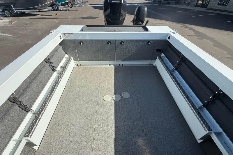 Slide: The Image of 2025 Hewescraft 200 ProV ET Hardtop boat interior with spacious deck and storage compartments. - 6