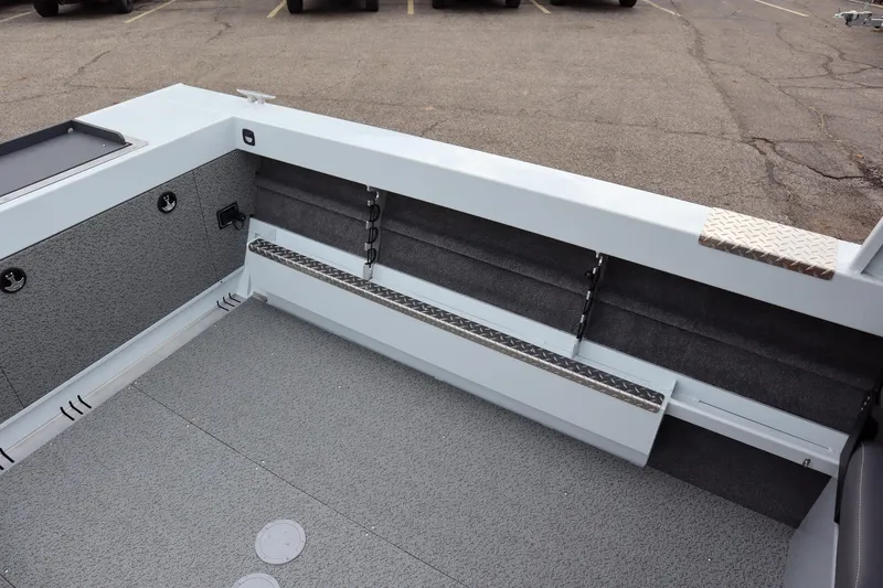 Slide: The Image of 2025 Hewescraft 200 ProV ET HT boat interior with spacious deck and storage. - 8