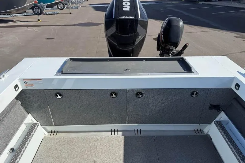 Slide: The Image of 2025 Hewescraft 200 ProV ET Hardtop boat interior with Mercury outboard motor. - 9