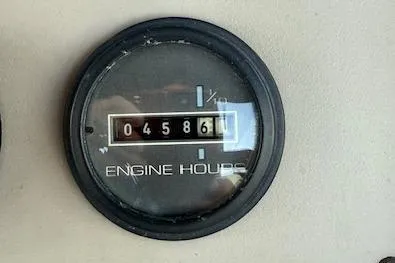 Slide: The Image of Engine hour meter showing 4586 hours on a 1999 Carver 380 Santego. - 21