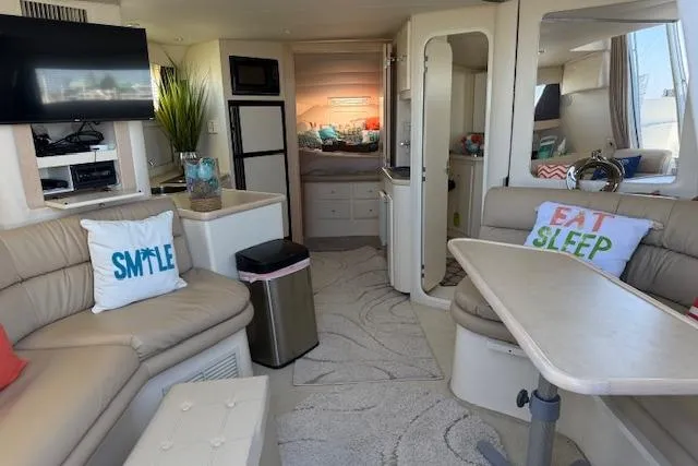 Slide: The Image of Interior of 1999 Carver 380 Santego yacht with modern furnishings and decor. - 14