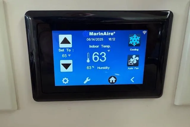 Slide: The Image of Digital thermostat display on Carver 380 Santego, showing 63°F and 63% humidity. - 20