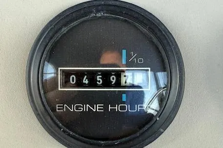 Slide: The Image of 1999 Carver 380 Santego engine hour meter showing 4597 hours. - 22