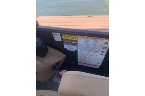 Slide: The Image of Interior view of 2026 Godfrey Sweetwater 2286 SFL boat with safety instructions. - 6