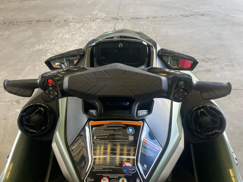 Slide: The Image of 2023 Sea-Doo GTX Limited 300 dashboard and handlebars in a garage setting. - 5