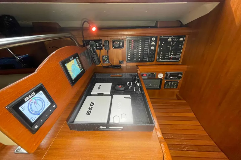 Slide: The Image of Control panel of 2003 Hunter 426 Deck Salon with navigation instruments and displays. - 33