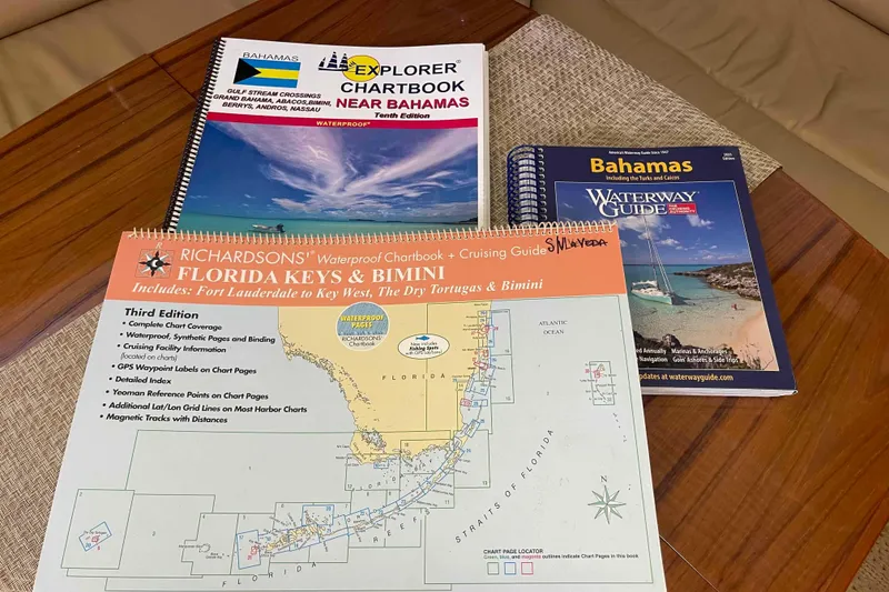 Slide: The Image of Nautical chartbooks and guides for Florida Keys and Bahamas on a Hunter 426 Deck Salon, 2003. - 39